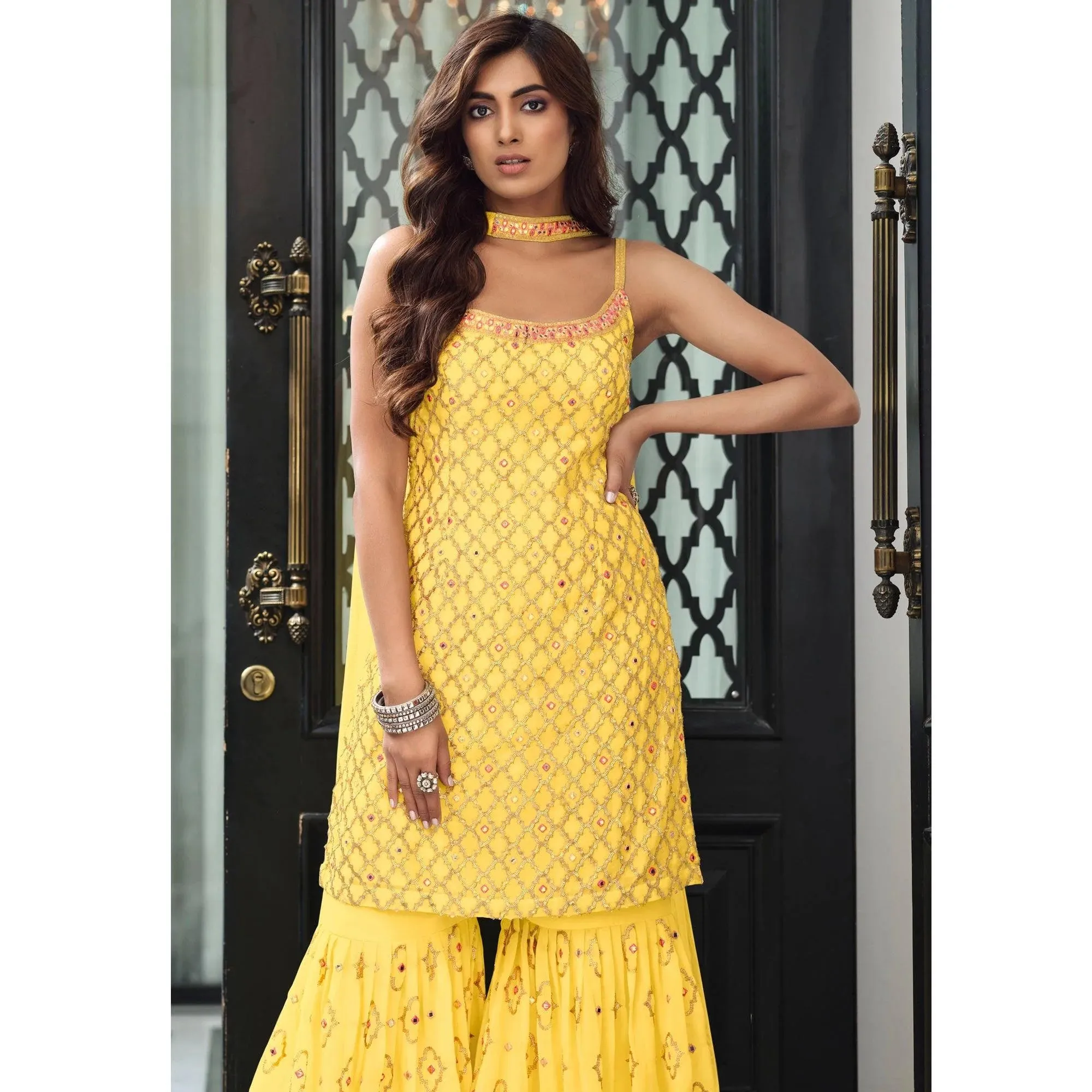 Appealing Ethnic Wear Yellow Colored Kurti And Palazzo Suits With Dupatta