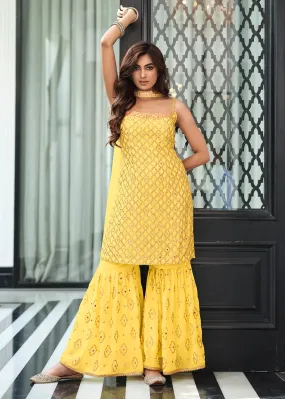 Appealing Ethnic Wear Yellow Colored Kurti And Palazzo Suits With Dupatta