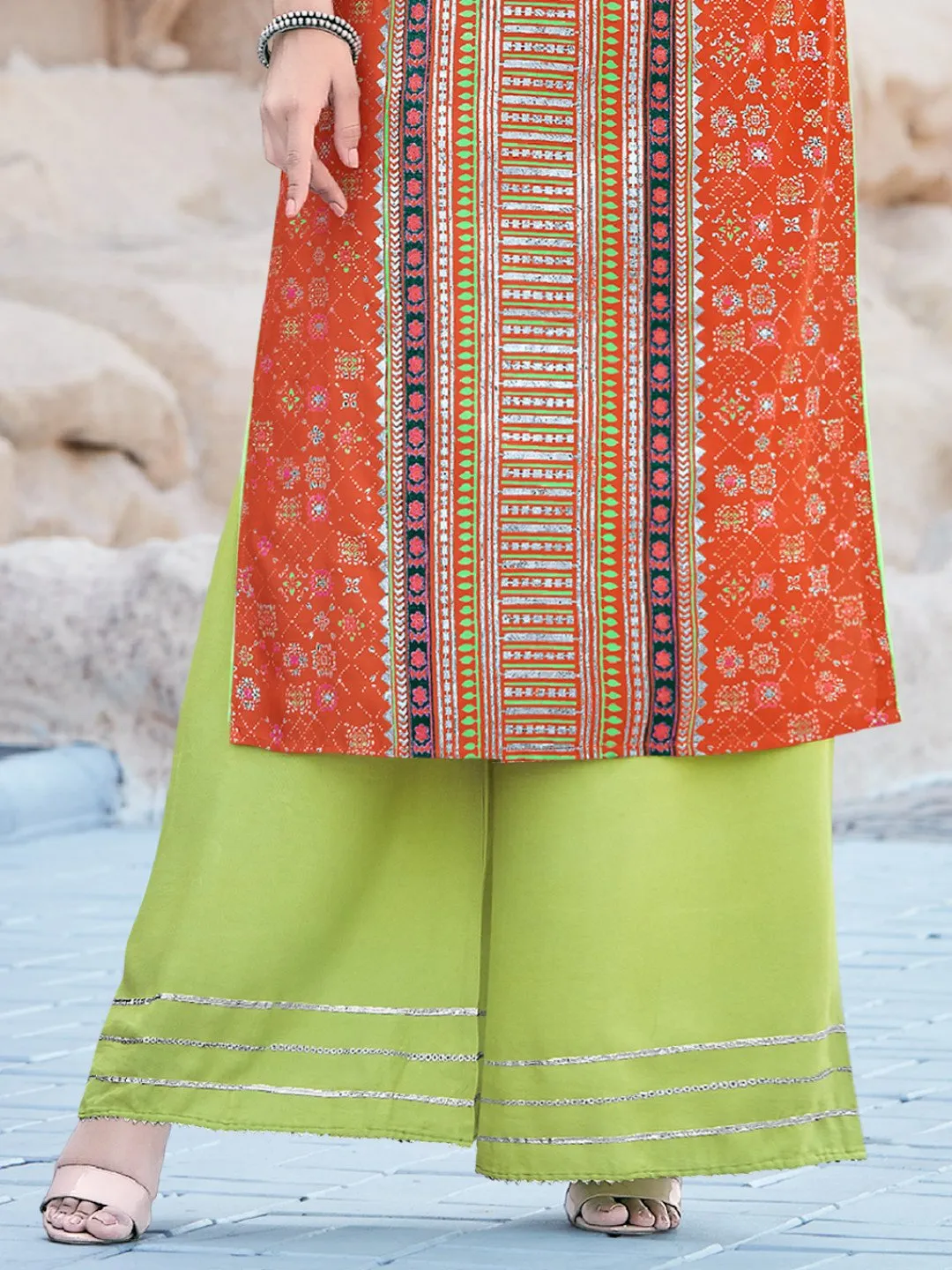 Appealing Orange Color Printed Kurti With Green Palazzo Pants