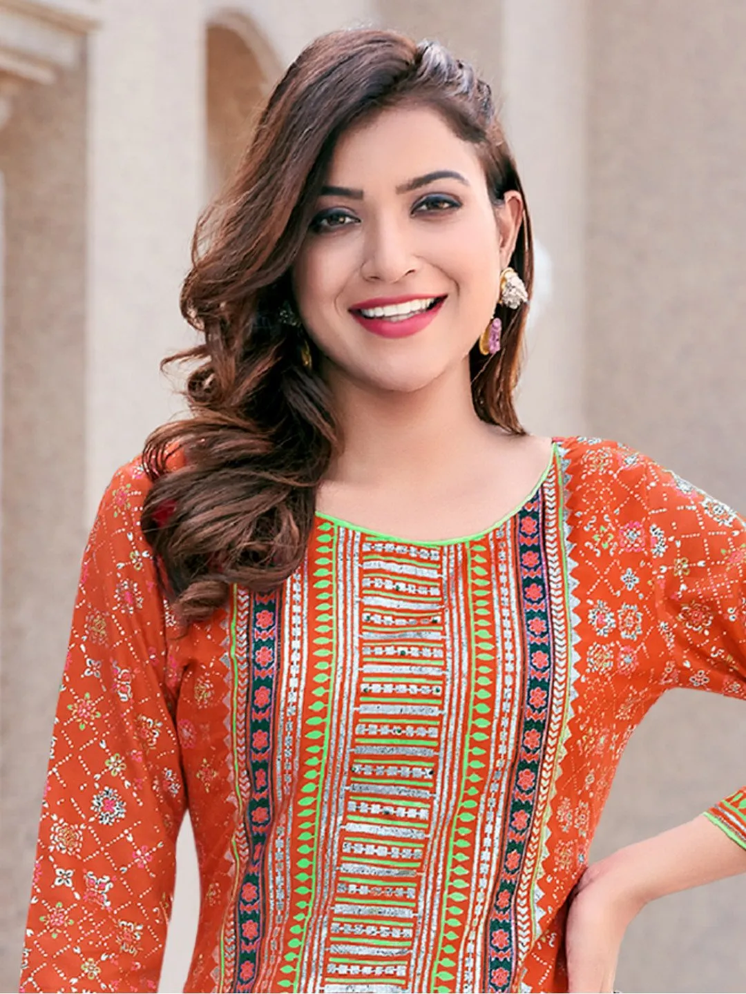 Appealing Orange Color Printed Kurti With Green Palazzo Pants